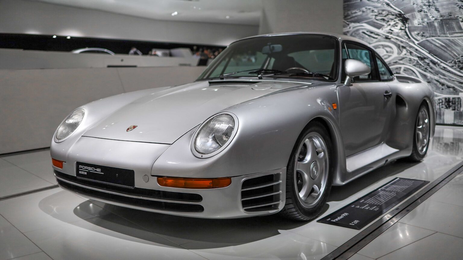 Porsche 911 sports car in front three-quarter view