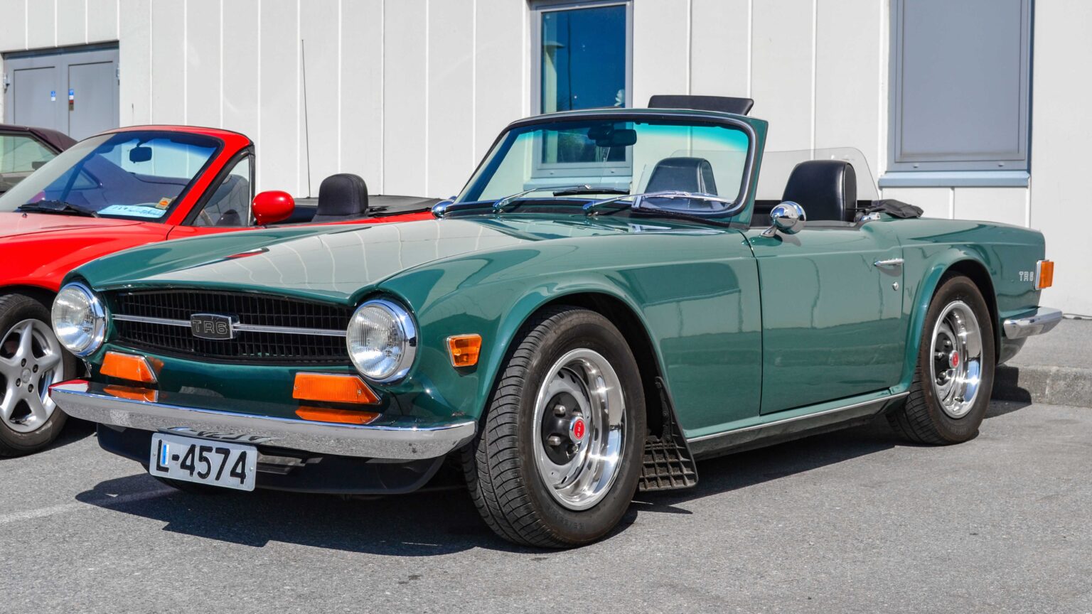 Classic Triumph roadster in front three-quarter view